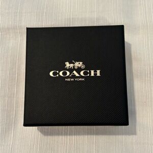 Coach earrings.